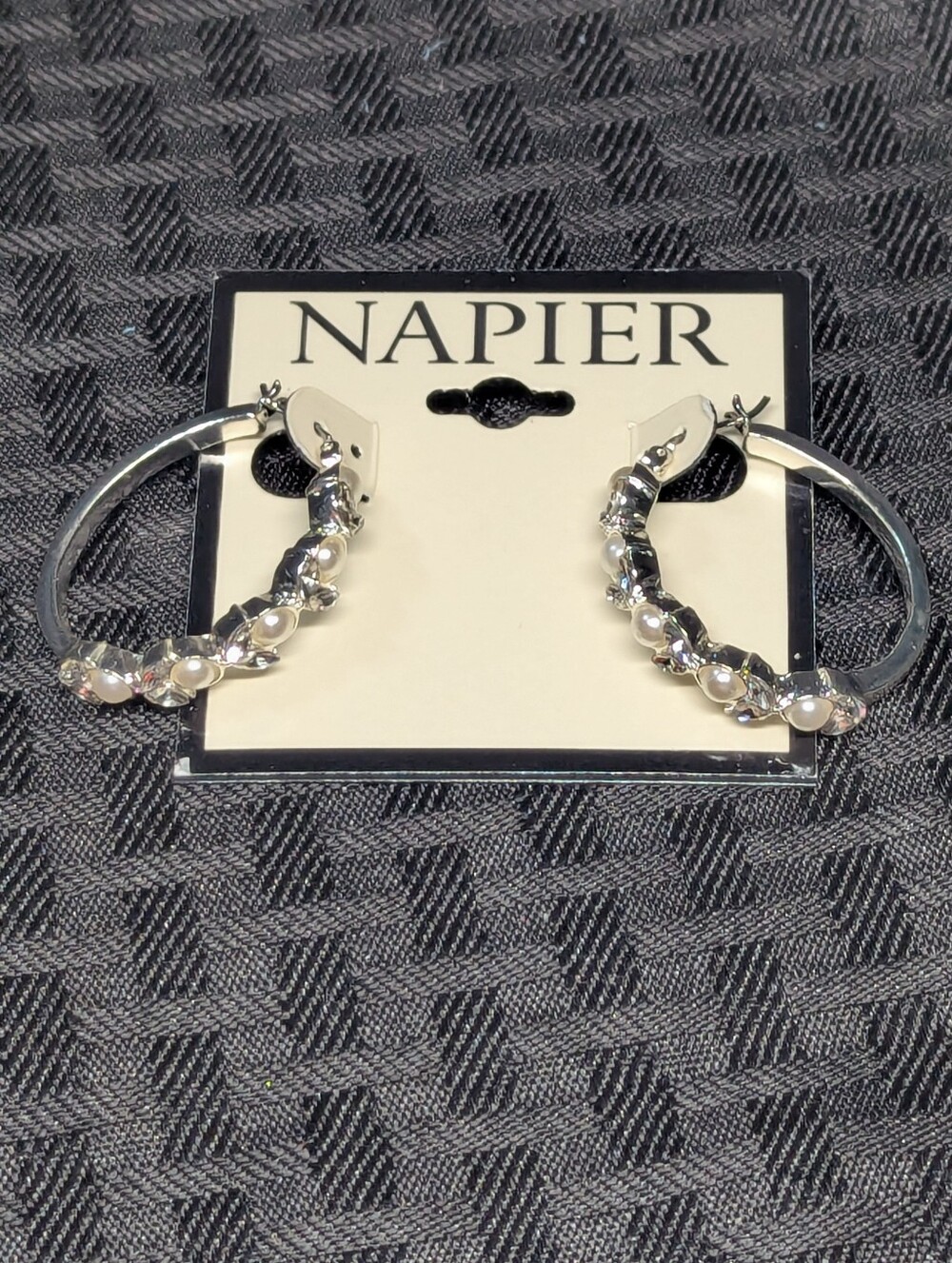 Napier Silver Hoop Earrings with Cubic Zirconia Pearlescent Accents.